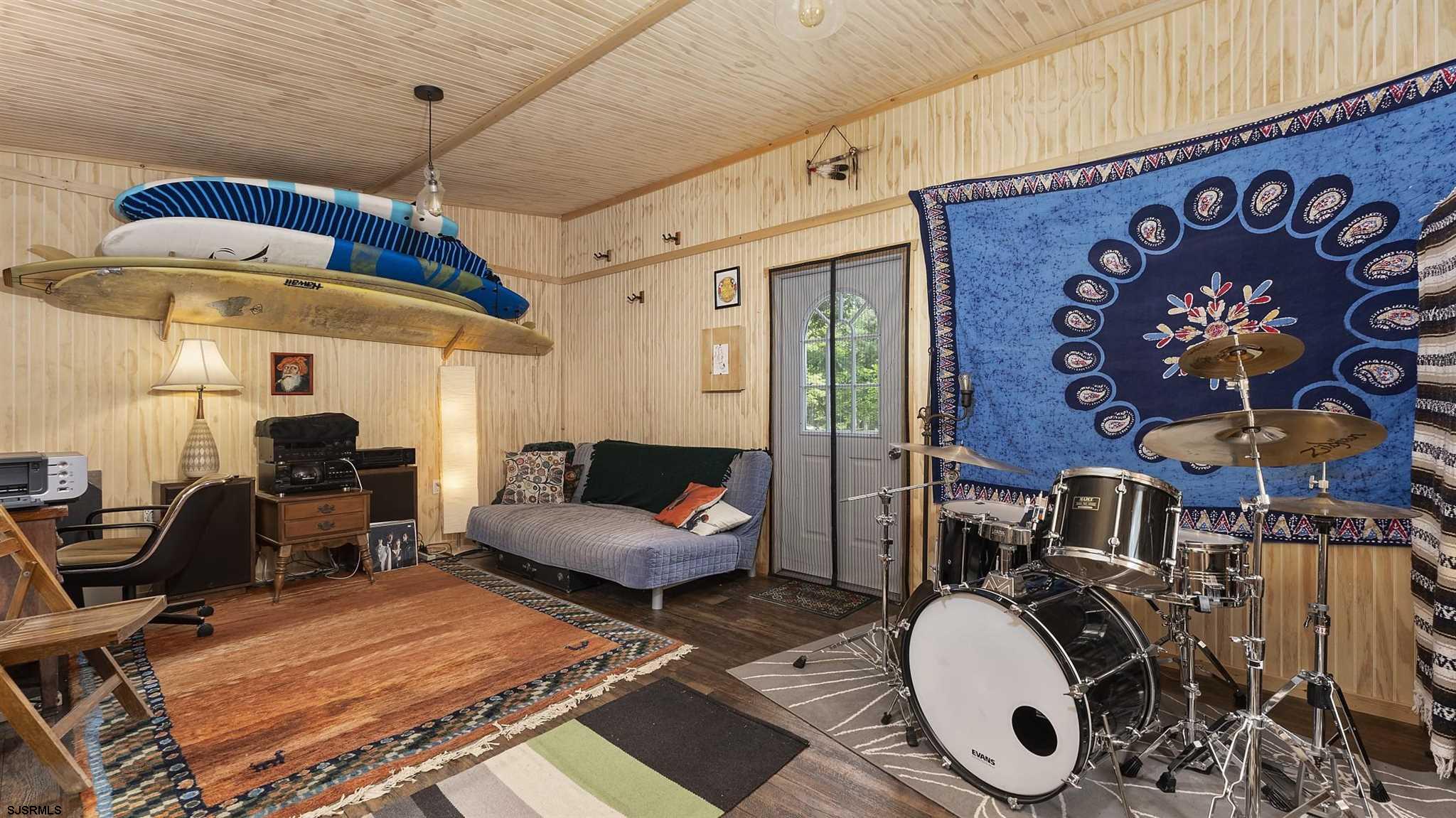 26 Indian Walk Road Ocean View, NJ 08230 - Photo 22 of 27 a living room with furniture and wooden floor