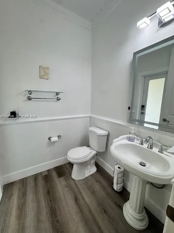 a bathroom with a sink and a toilet