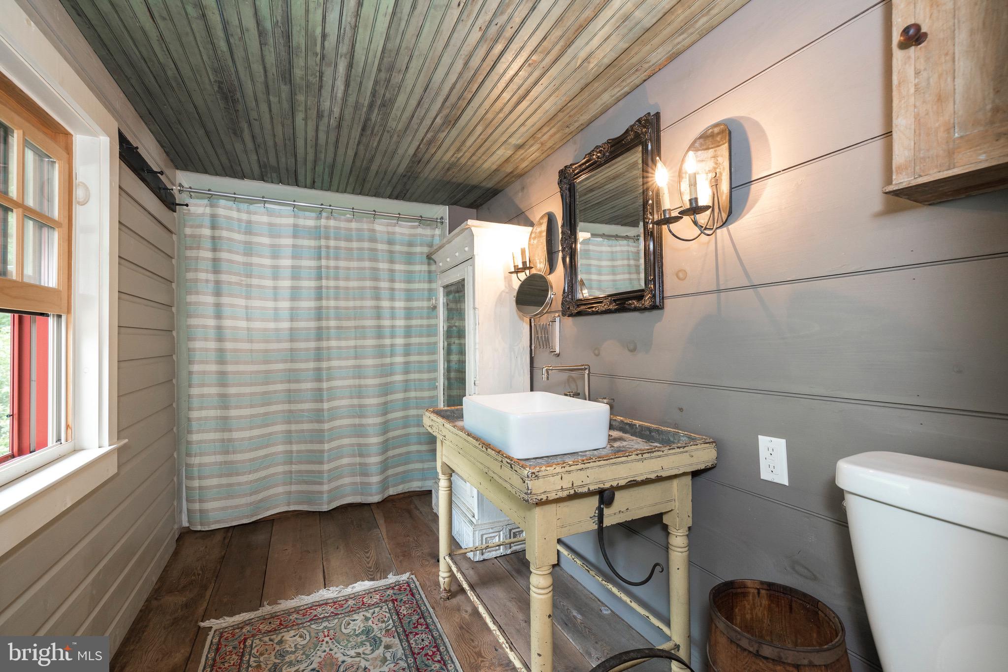 155 Mill Road Morgantown, PA 19543 - Photo 36 of 57 Second floor full bath with shiplap walls