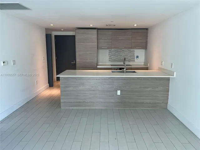 a room with a bed and a window