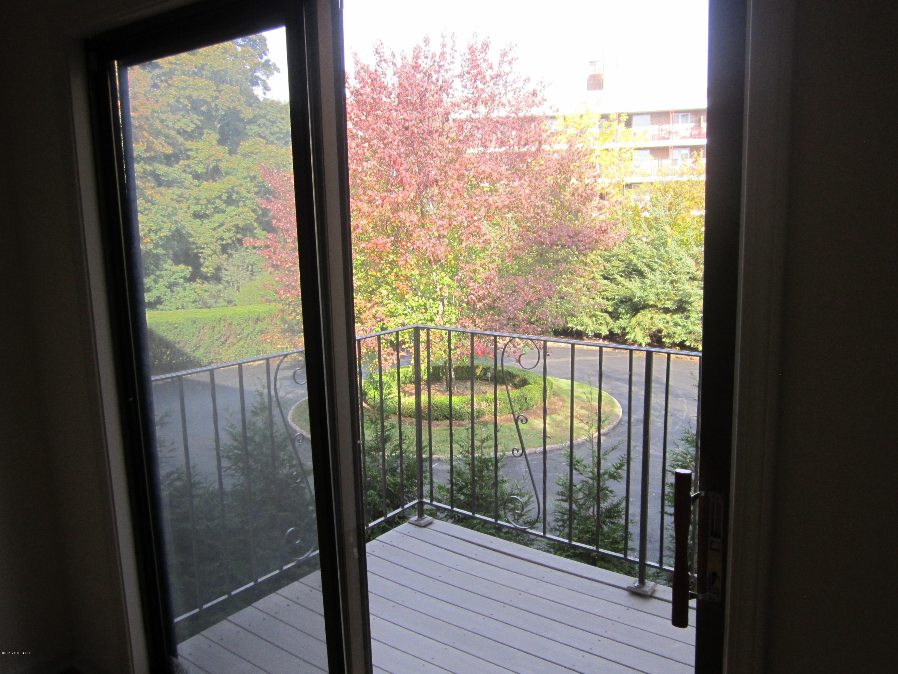 140 Field Point Road, Unit 21 Greenwich, CT 06830 - Photo 4 of 12 a view of a room from a window