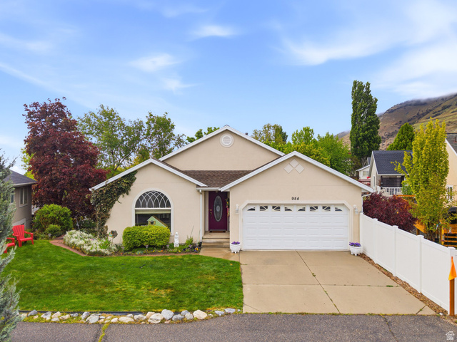 954 South Slate Drive Provo, UT 84606 - Photo 1 of 1 Single story home featuring stucco siding, driveway, and an attached garage