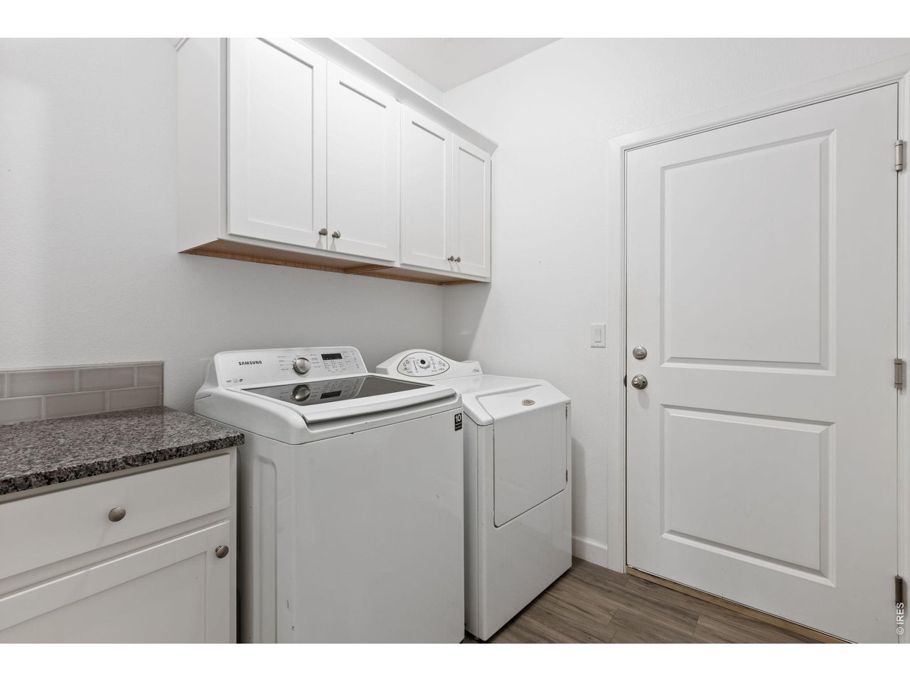 6511 19th Street Greeley, CO 80634 - Photo 16 of 26 Separate Laundry Room with Washer/Dryer Included