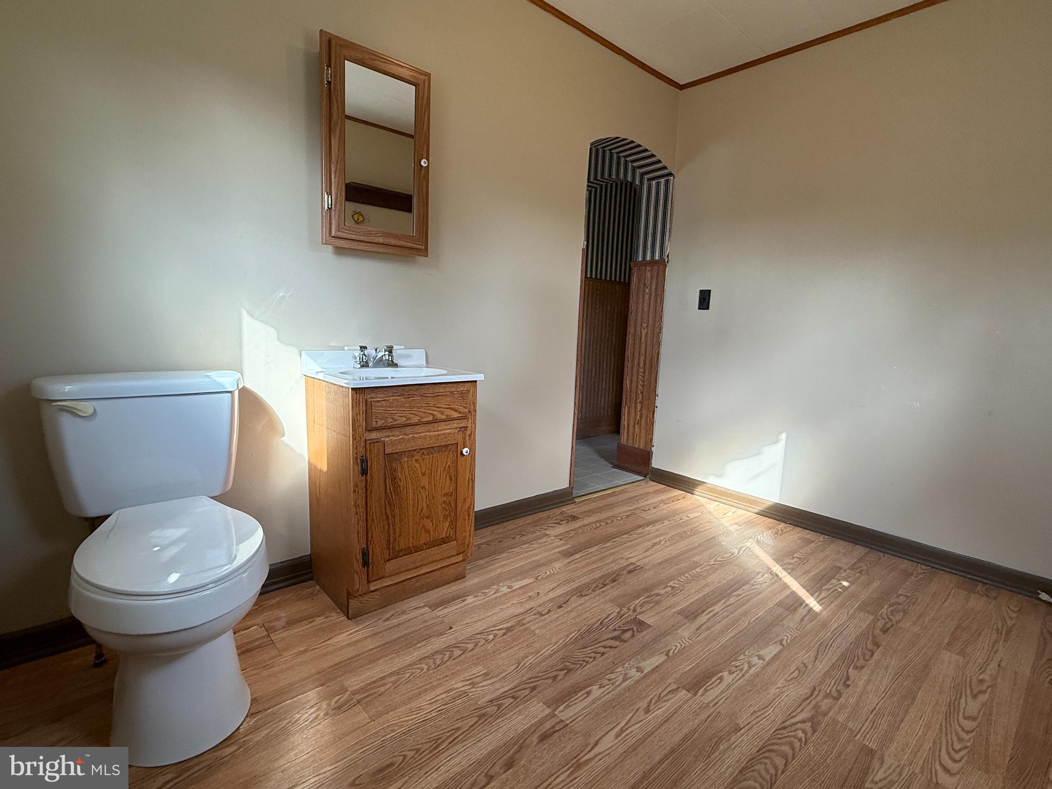 112 South Ridge Street Burnham, PA 17009 - Photo 15 of 33 a bathroom with a toilet and a sink