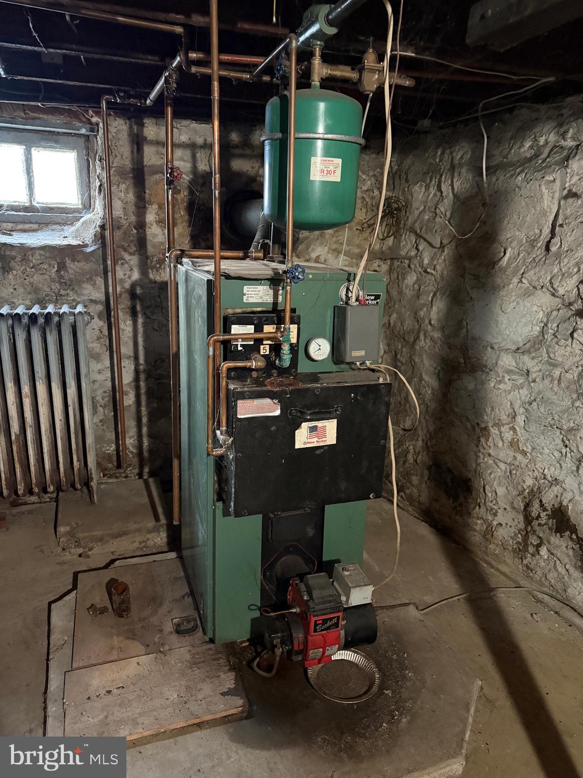 112 South Ridge Street Burnham, PA 17009 - Photo 24 of 33 a room with water heater and storage