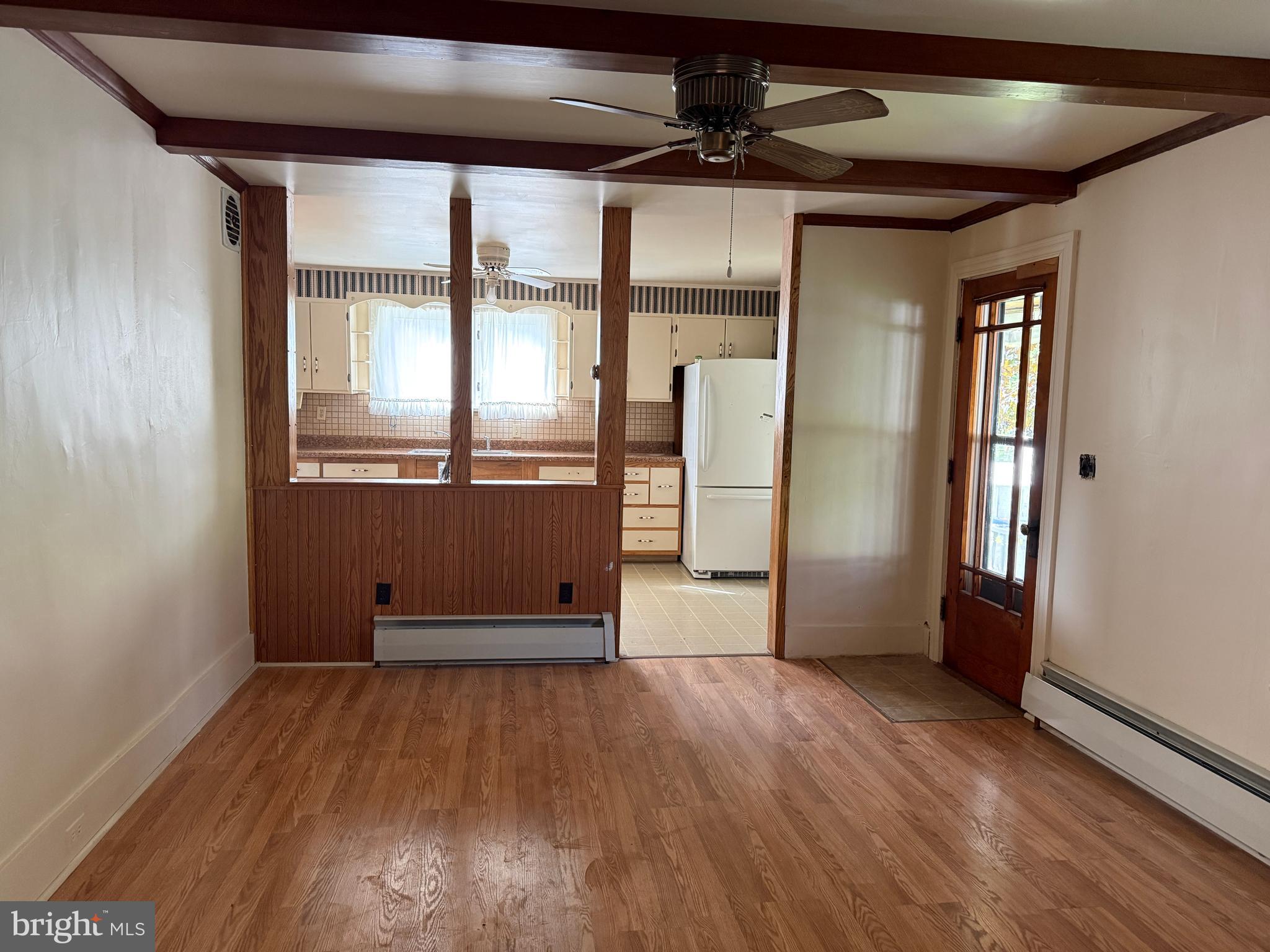 112 South Ridge Street Burnham, PA 17009 - Photo 8 of 33 an empty room with wooden floor and windows