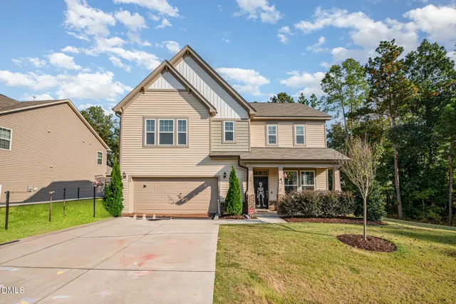a view of outdoor space yard and front view of a house