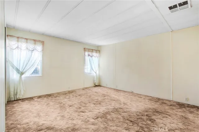 a bathroom with a sink double vanity and a mirror