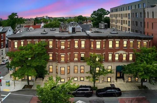 a front view of a building with balcony