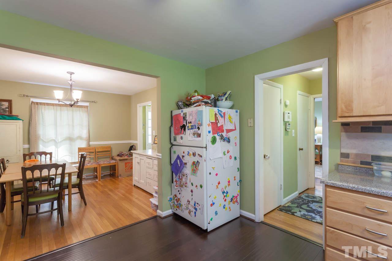 1733 Euclid Road Durham, NC 27713 - Photo 11 of 25 a view of kitchen with furniture and wooden floor