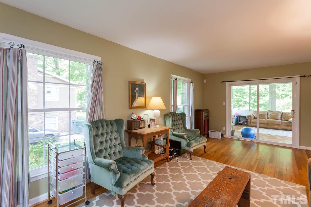 1733 Euclid Road Durham, NC 27713 - Photo 14 of 25 a living room with furniture and a large window