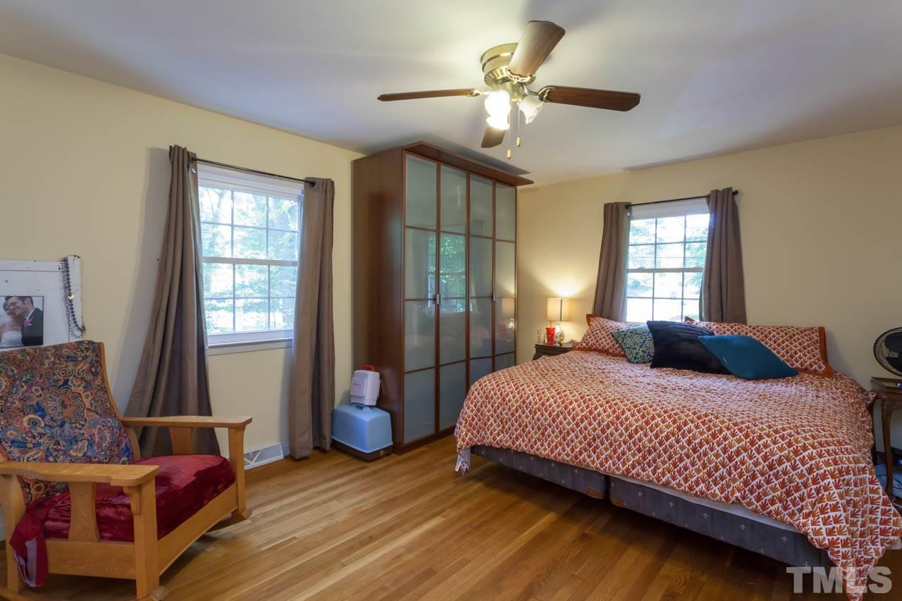 1733 Euclid Road Durham, NC 27713 - Photo 18 of 25 a bedroom with a bed and window