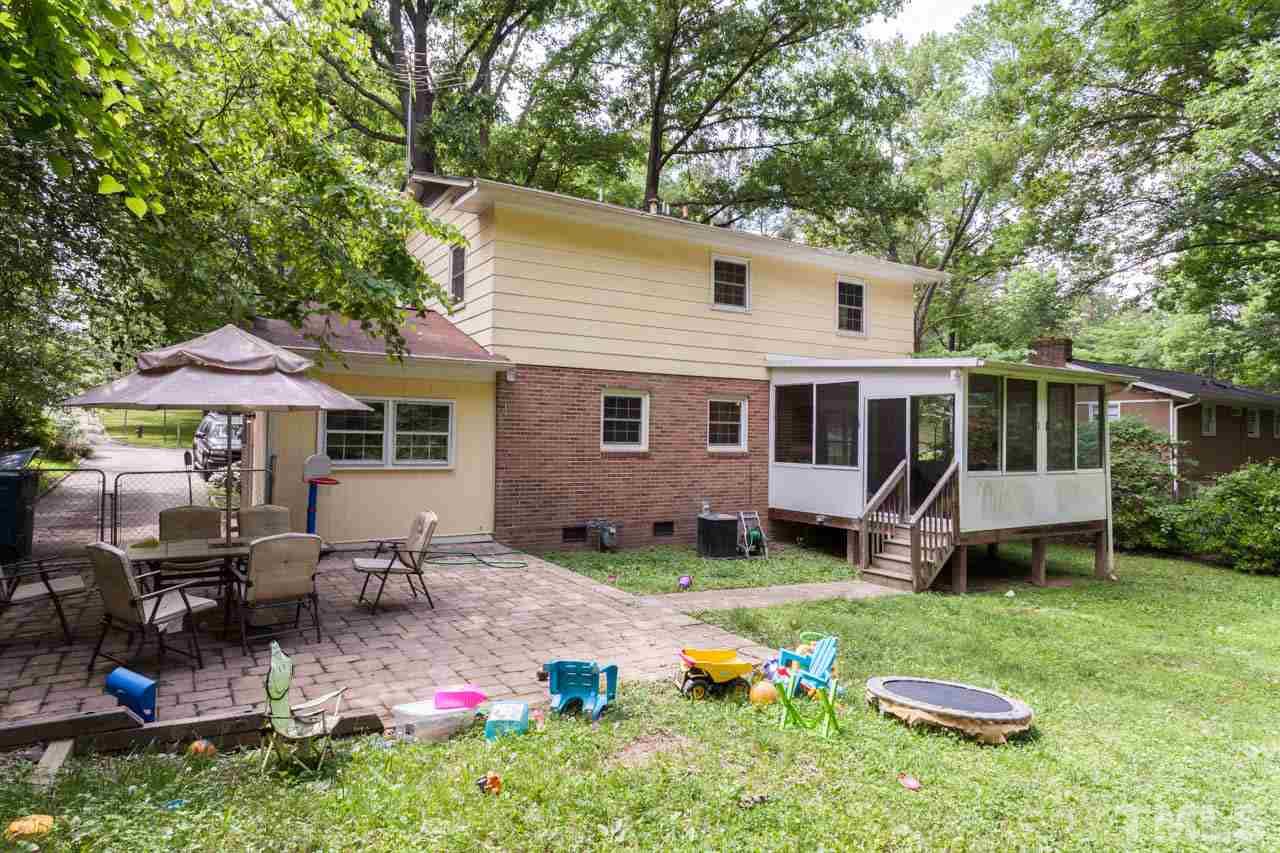 1733 Euclid Road Durham, NC 27713 - Photo 23 of 25 a view of a house with a backyard and sitting area