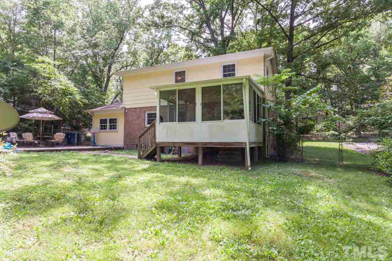 1733 Euclid Road Durham, NC 27713 - Photo 24 of 25 a view of a house with a yard and a tree