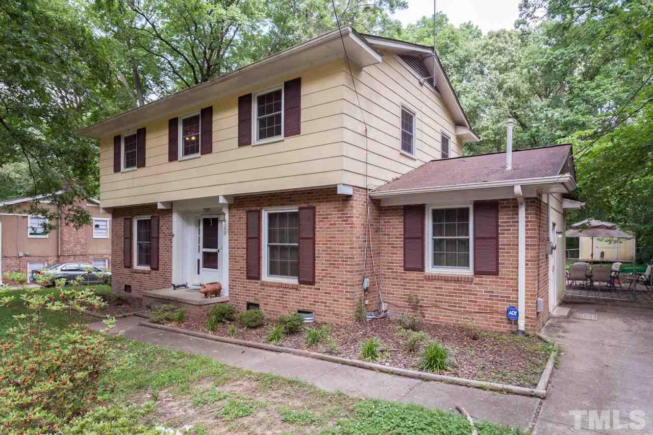 1733 Euclid Road Durham, NC 27713 - Photo 4 of 25 a front view of a house with garden