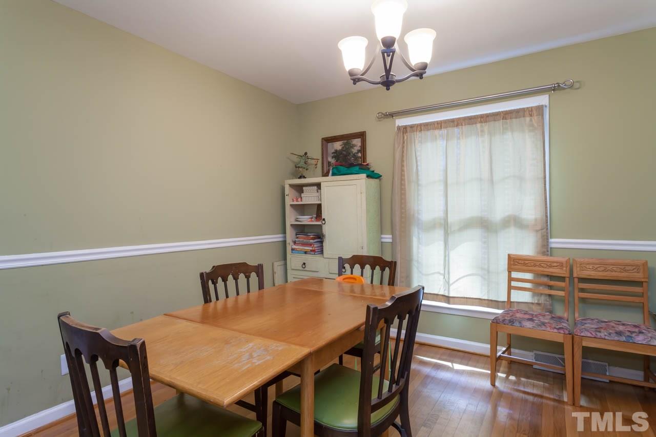 1733 Euclid Road Durham, NC 27713 - Photo 8 of 25 a view of a dining room with furniture window and wooden floor