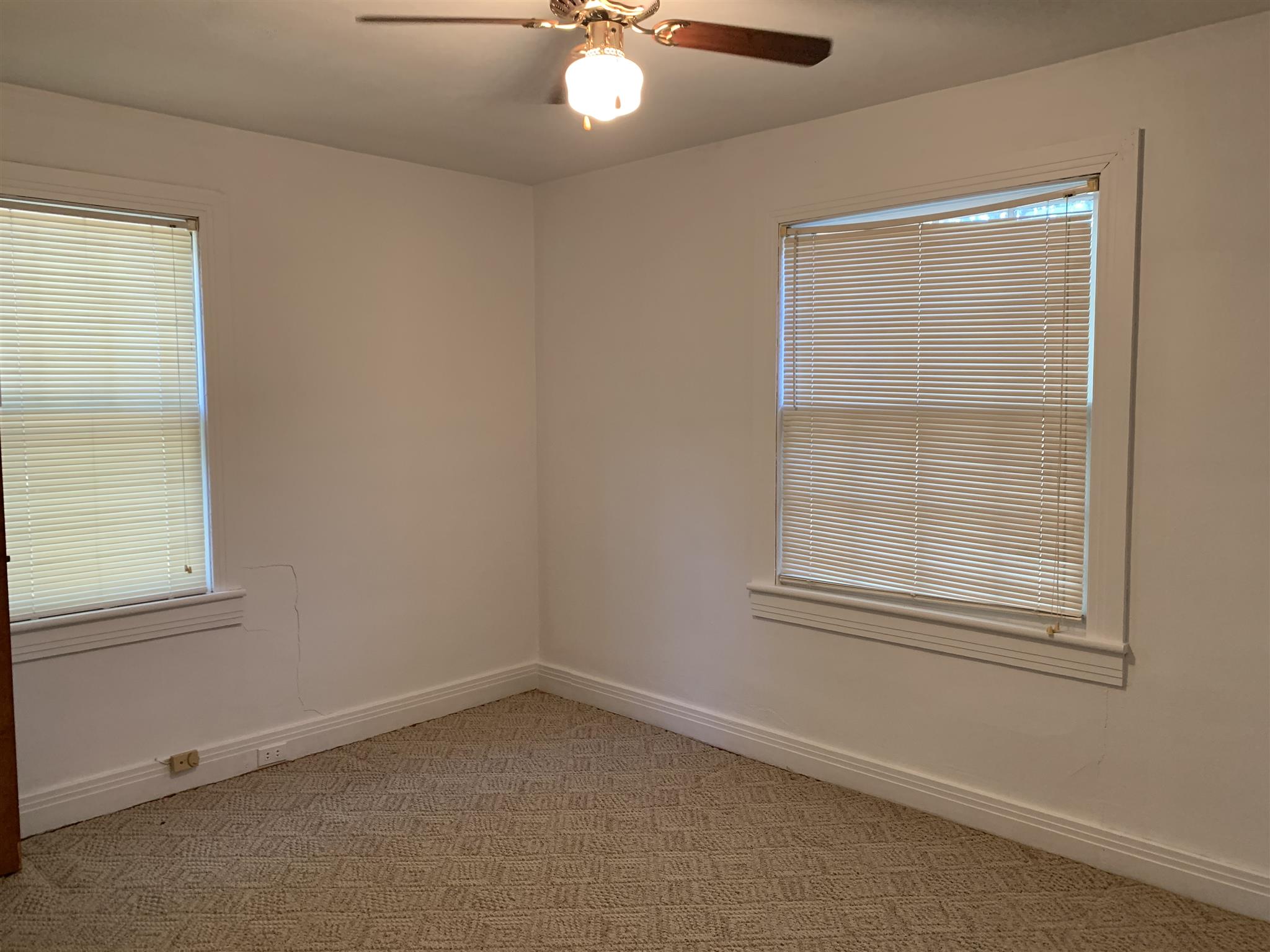 1303 Academy Road Portland, TN 37148 - Photo 2 of 30 an empty room with a window