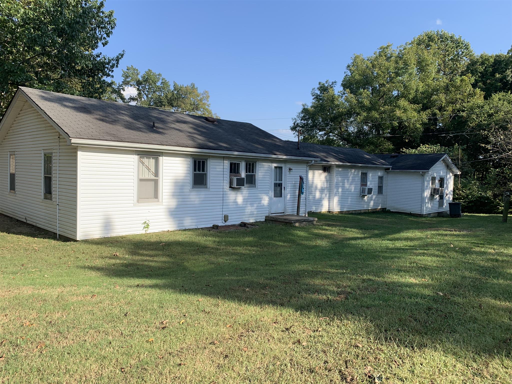 1303 Academy Road Portland, TN 37148 - Photo 29 of 30 a front view of house with yard and trees