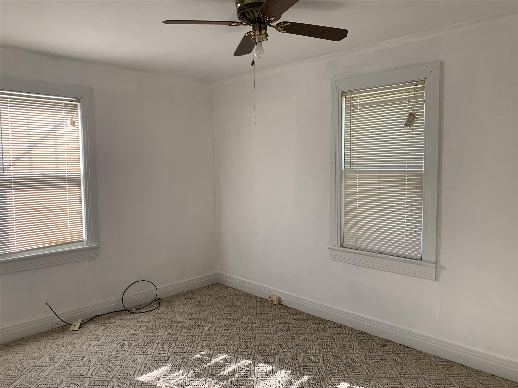 1303 Academy Road Portland, TN 37148 - Photo 4 of 30 an empty room with a window