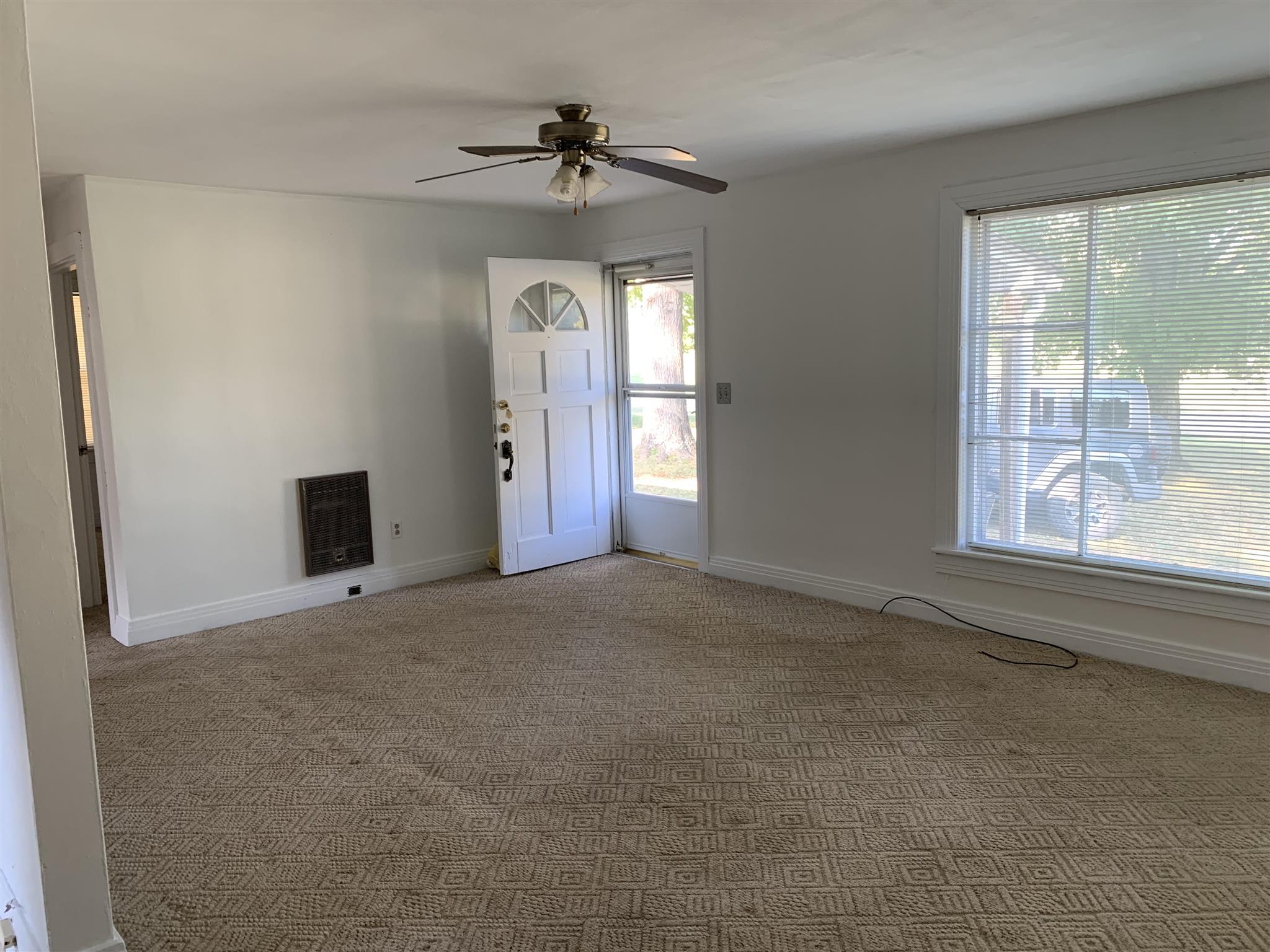 1303 Academy Road Portland, TN 37148 - Photo 7 of 30 a view of an empty room with a window