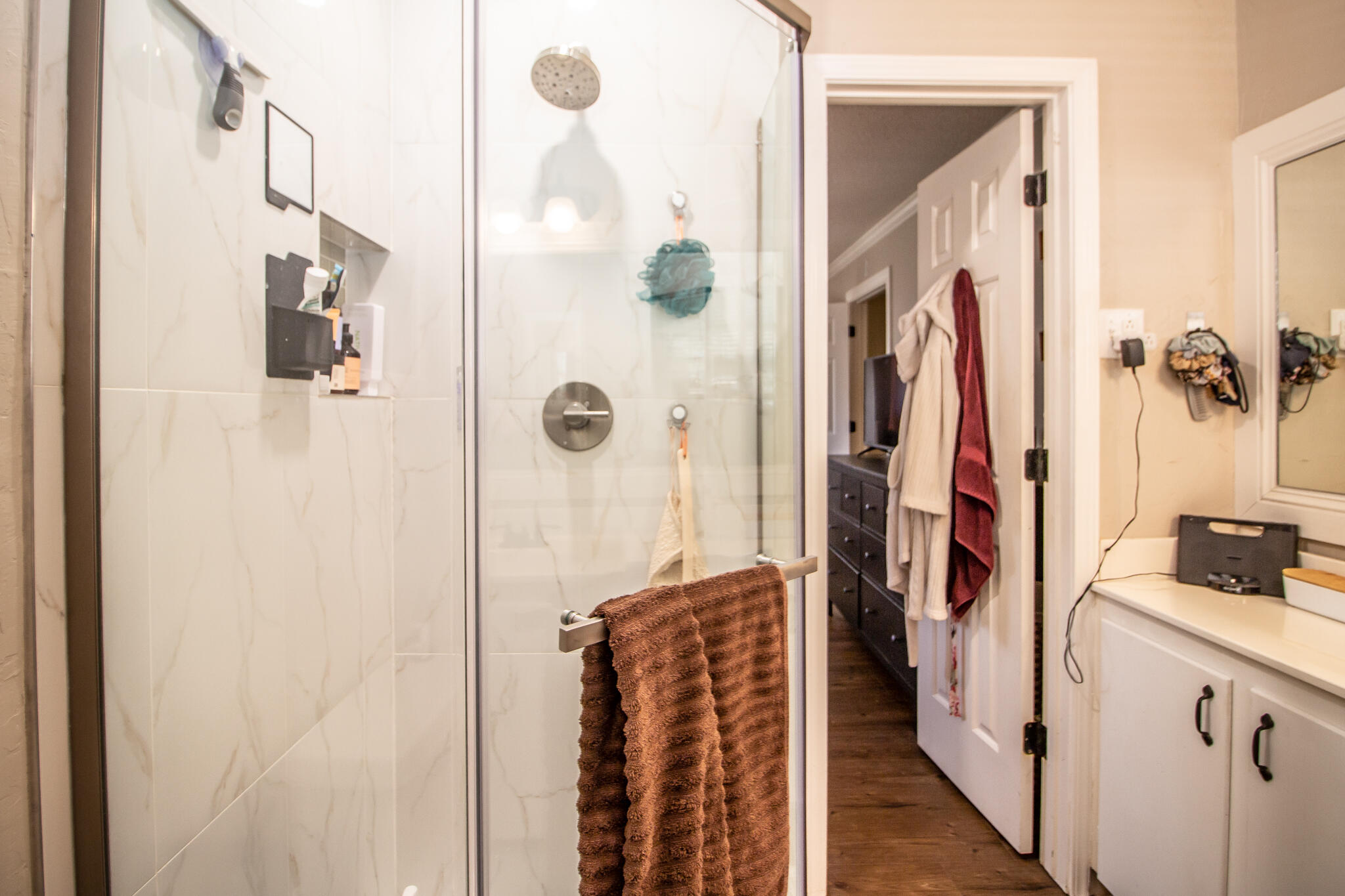 5219 9th Street Lubbock, TX 79416 - Photo 3 of 23 a bathroom with a shower