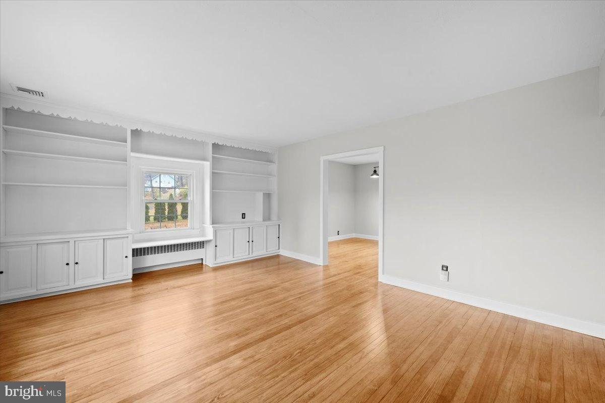 3349 Brodhead Road Bethlehem, PA 18020 - Photo 14 of 53 a view of empty room with wooden floor and cabinet
