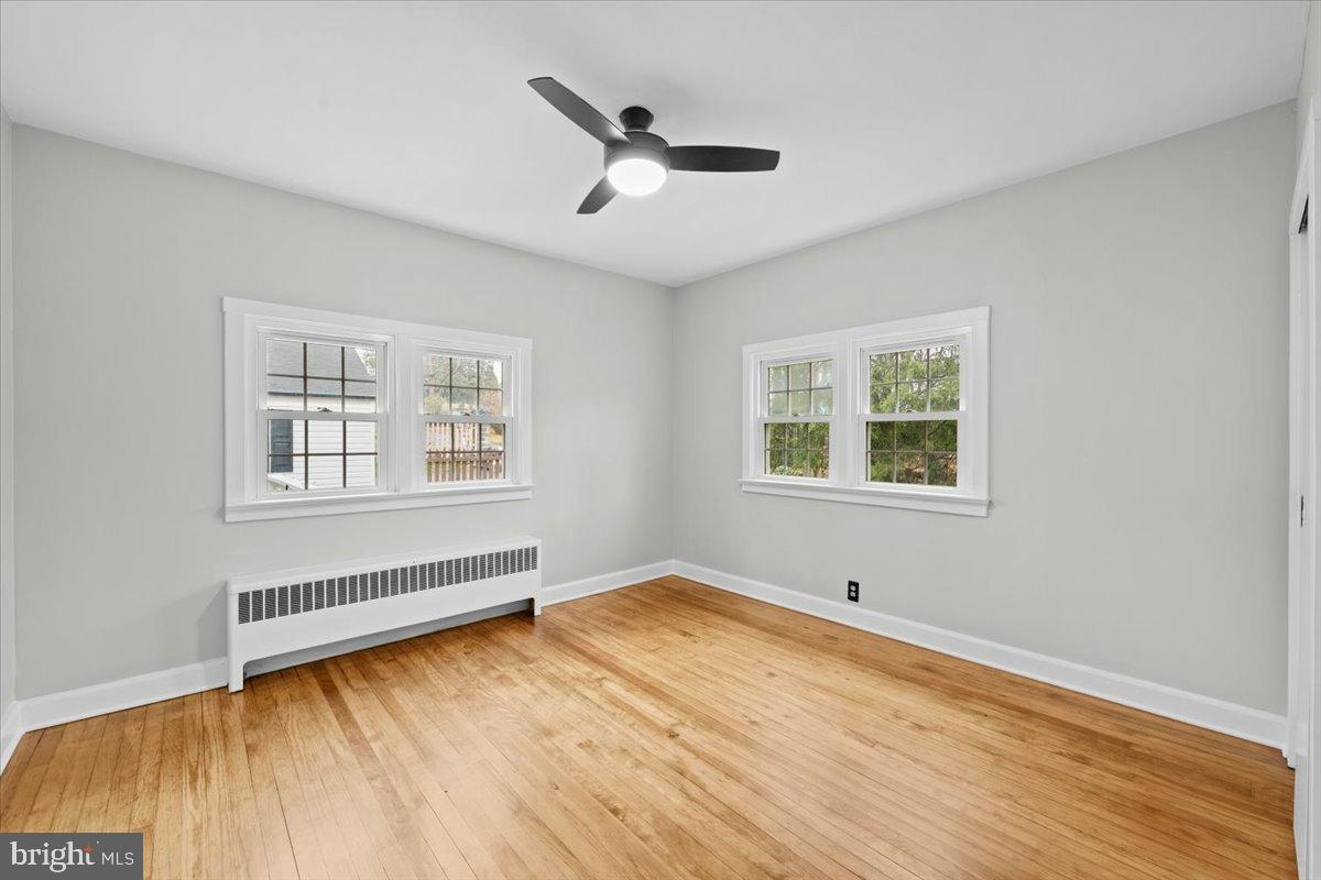 3349 Brodhead Road Bethlehem, PA 18020 - Photo 18 of 53 a view of an empty room with wooden floor and a window