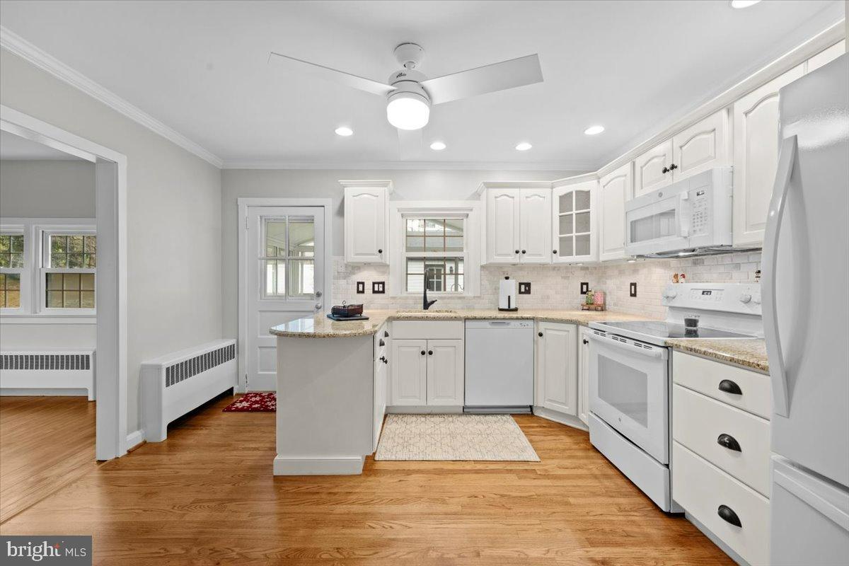 3349 Brodhead Road Bethlehem, PA 18020 - Photo 28 of 53 a kitchen with white cabinets and white appliances