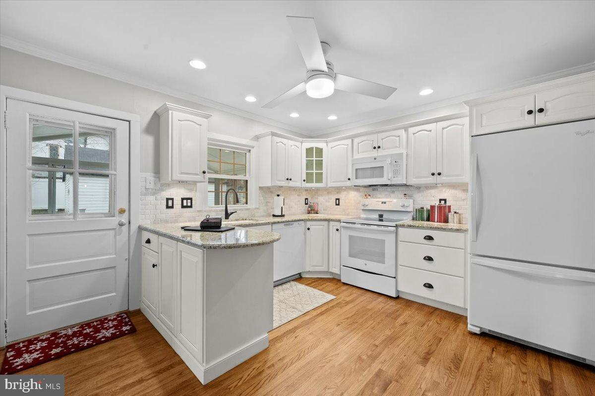 3349 Brodhead Road Bethlehem, PA 18020 - Photo 30 of 53 a kitchen with granite countertop white cabinets and white appliances