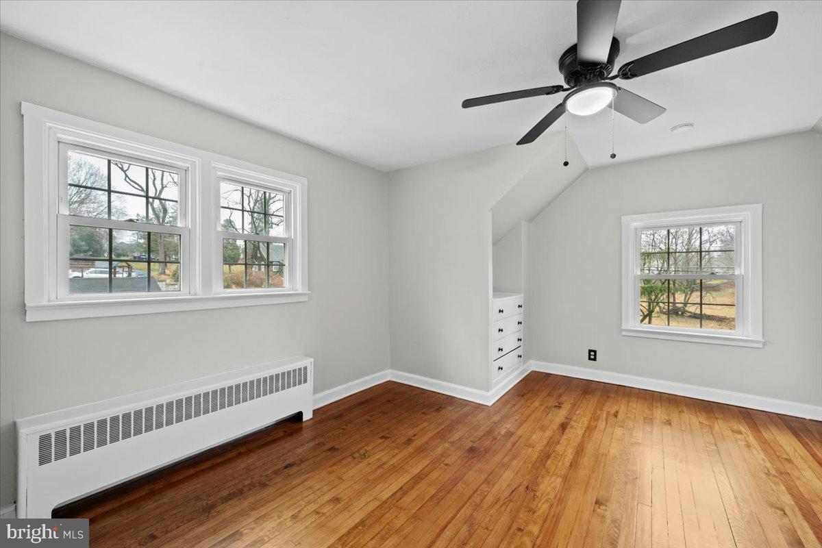 3349 Brodhead Road Bethlehem, PA 18020 - Photo 36 of 53 a view of an empty room with wooden floor and a window