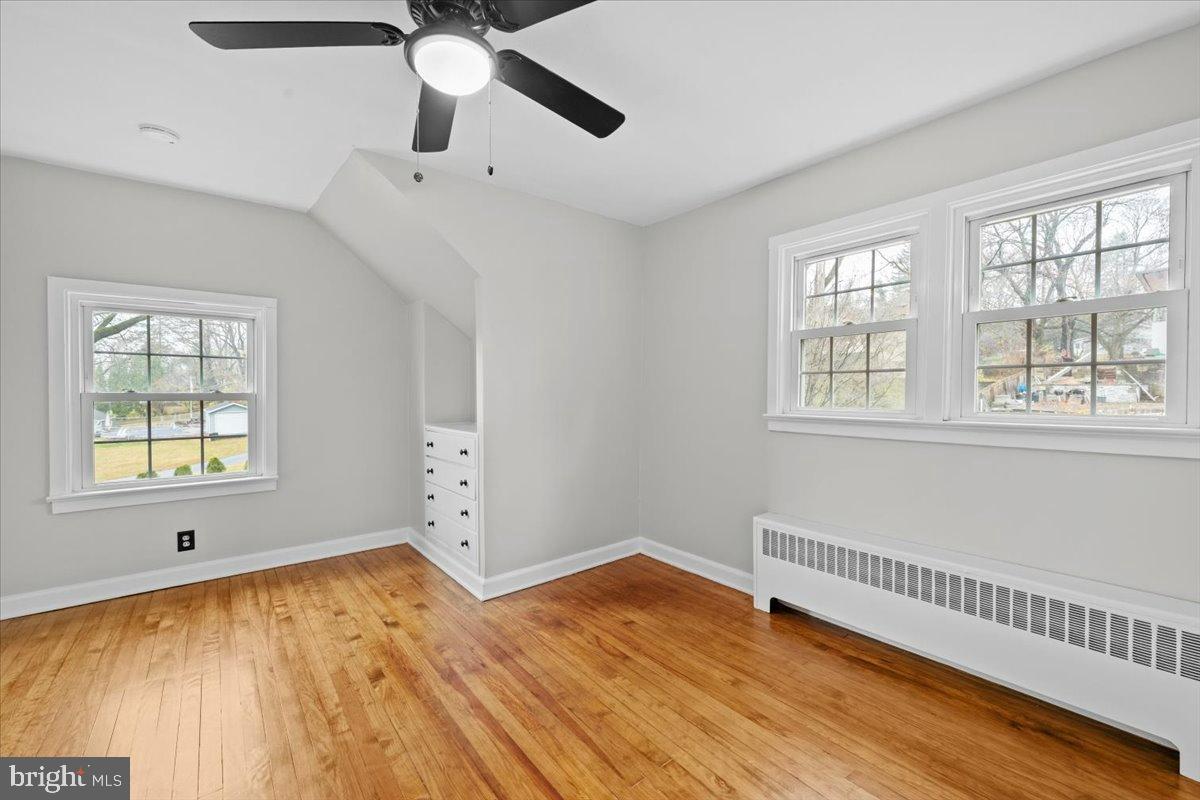 3349 Brodhead Road Bethlehem, PA 18020 - Photo 38 of 53 a view of an empty room with wooden floor and a window