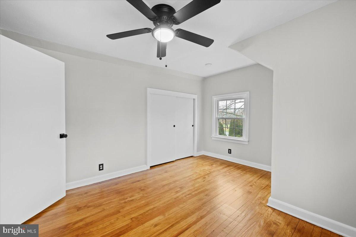 3349 Brodhead Road Bethlehem, PA 18020 - Photo 39 of 53 a view of an empty room with window and wooden floor