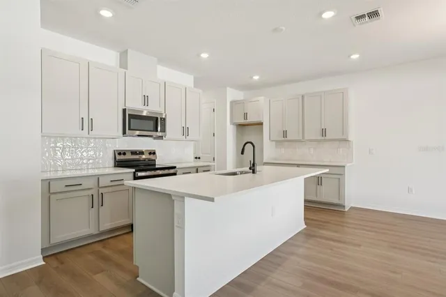 an empty room with windows