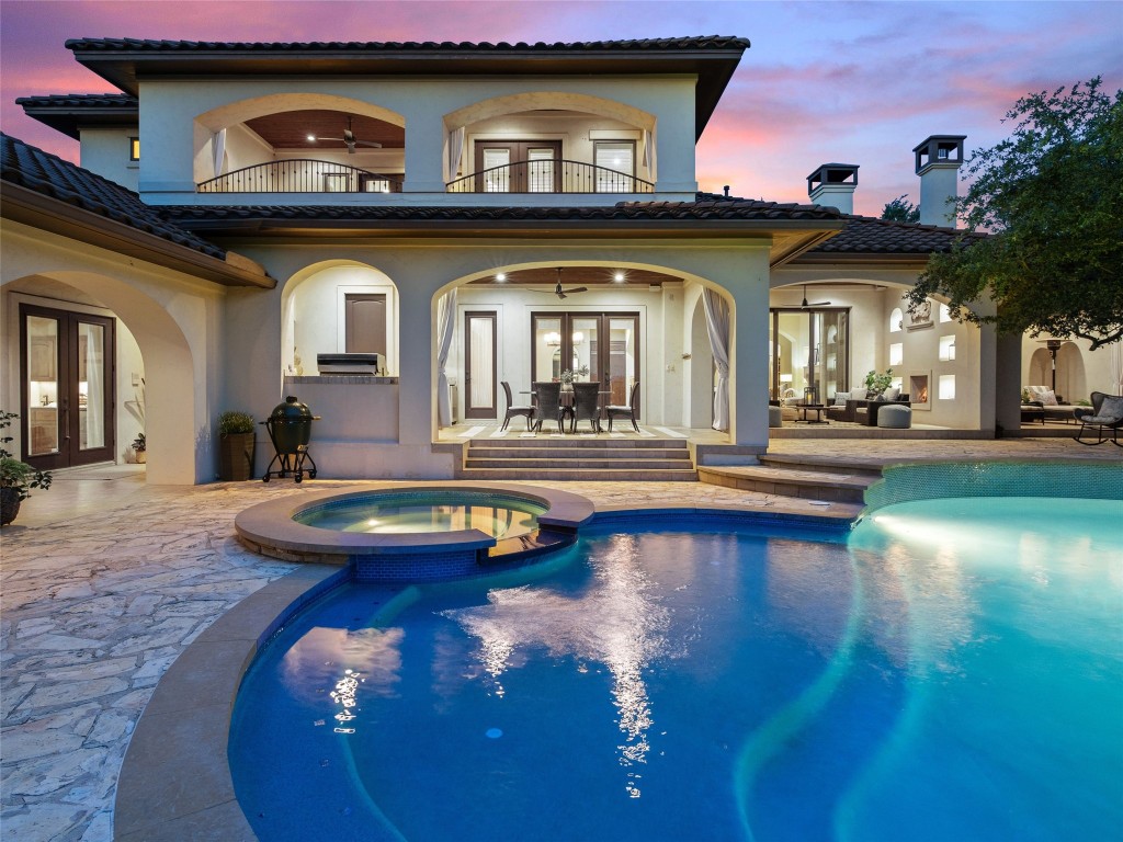 a view of a house with swimming pool