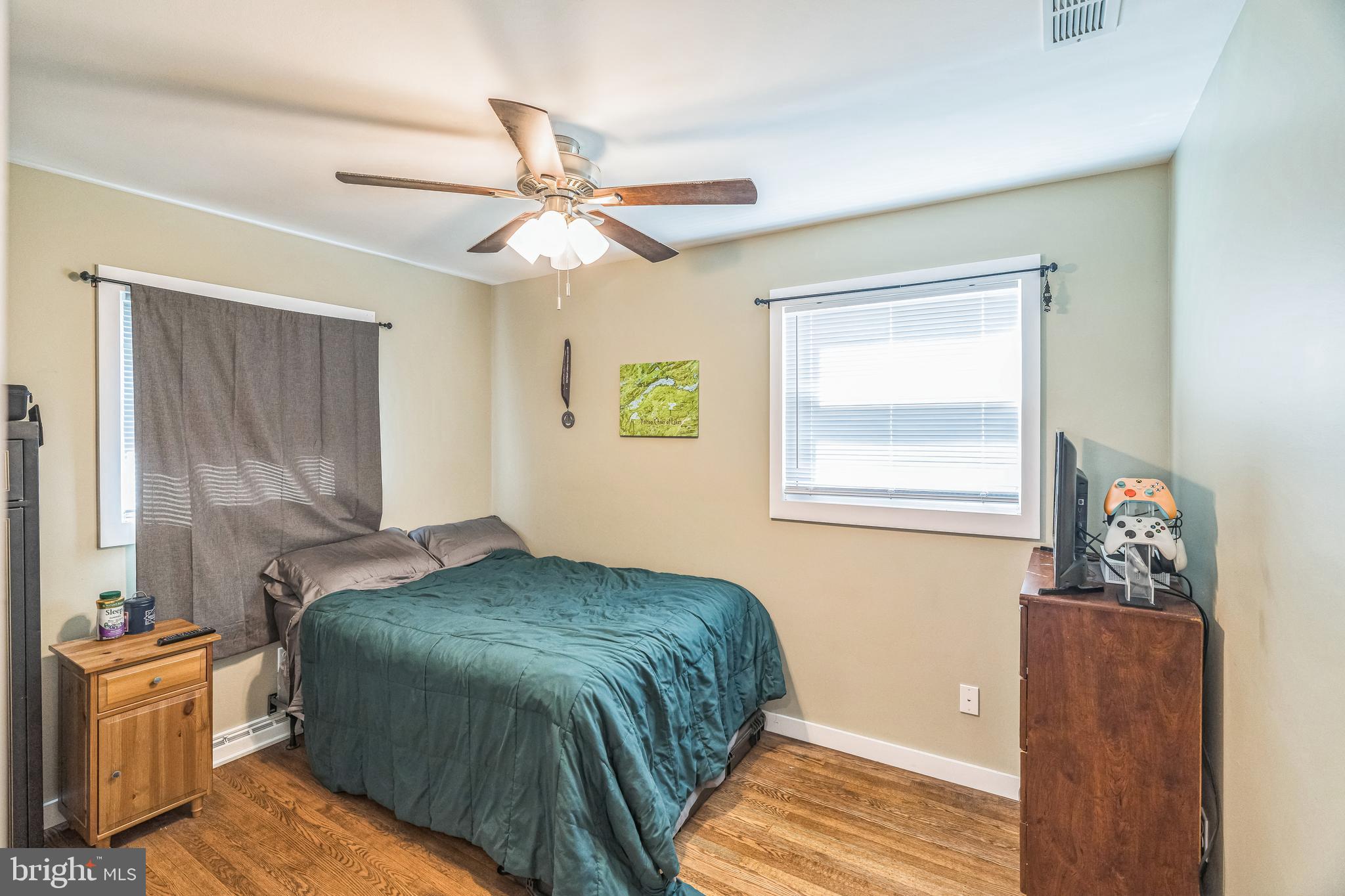 17 Gladwyn Road Marlton, NJ 08053 - Photo 21 of 34 a bedroom with a bed and wooden floor