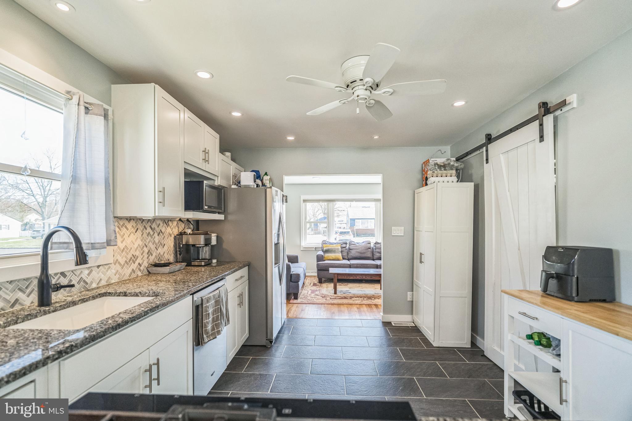 17 Gladwyn Road Marlton, NJ 08053 - Photo 9 of 34 a large kitchen with stainless steel appliances granite countertop a refrigerator and a sink
