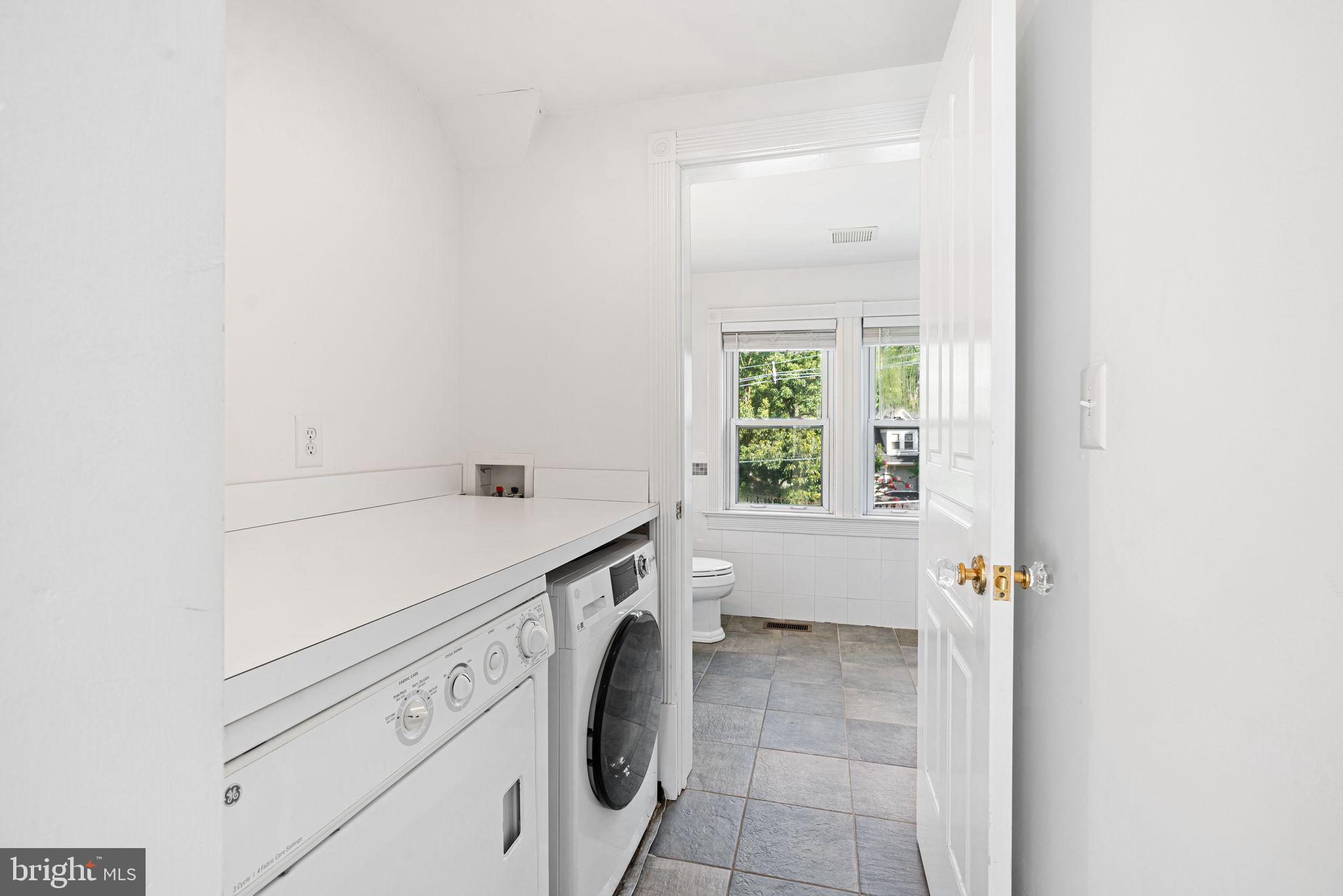 47 Estaugh Avenue Haddonfield, NJ 08033 - Photo 13 of 19 a utility room with dryer and washer