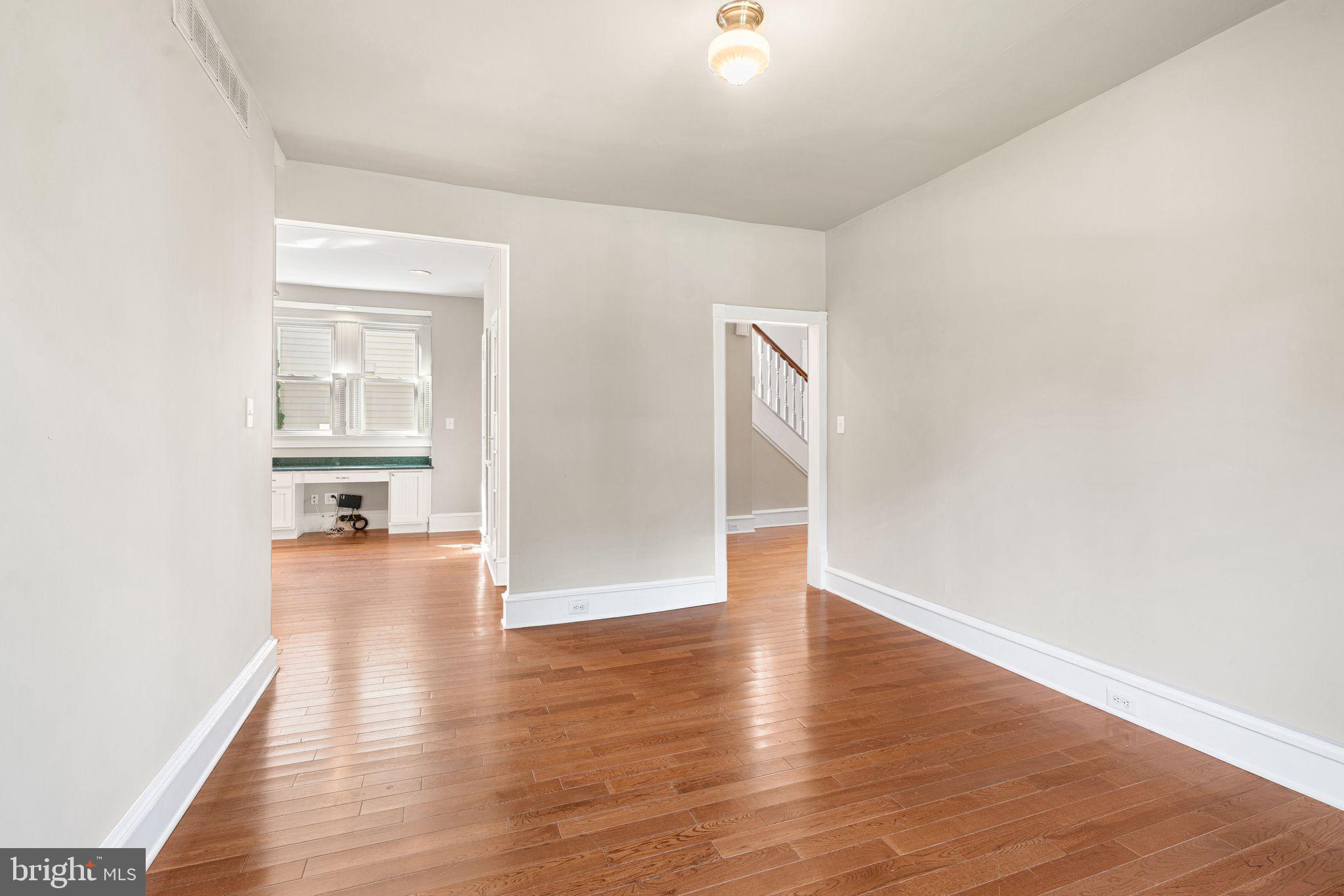 47 Estaugh Avenue Haddonfield, NJ 08033 - Photo 17 of 19 an empty room with wooden floor and windows