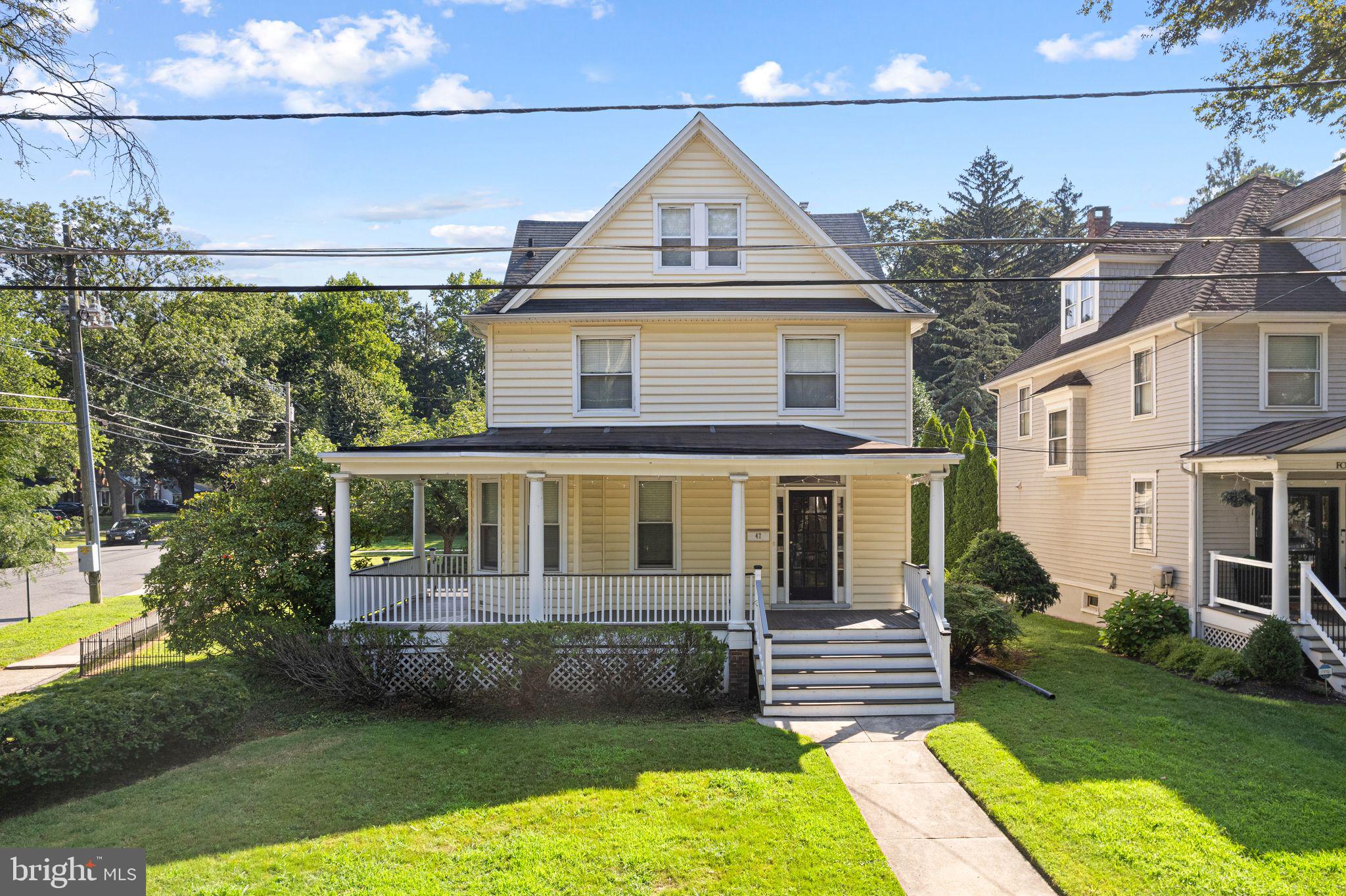 47 Estaugh Avenue Haddonfield, NJ 08033 - Photo 2 of 19 a front view of a house with a yard