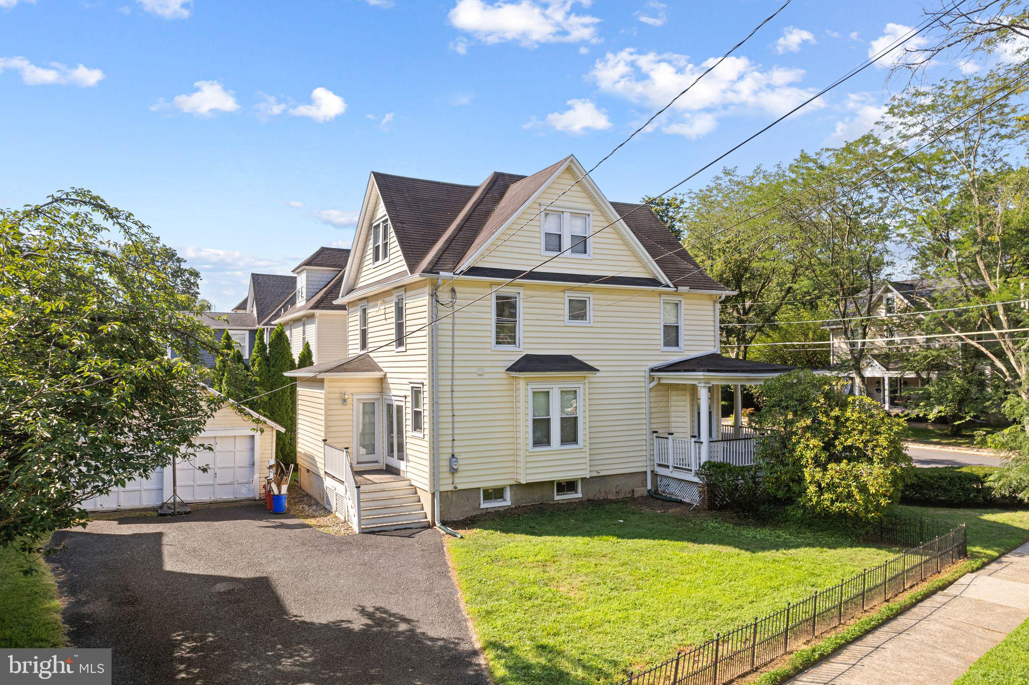 47 Estaugh Avenue Haddonfield, NJ 08033 - Photo 6 of 19 a front view of a house with yard