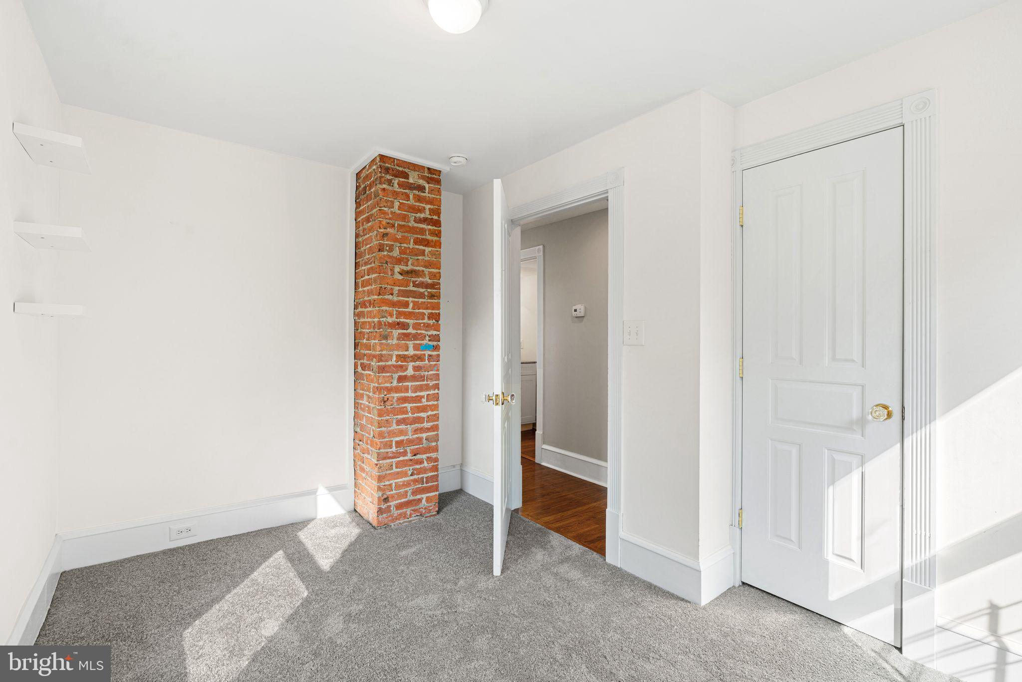 47 Estaugh Avenue Haddonfield, NJ 08033 - Photo 10 of 19 a view of an empty room with stairs