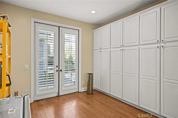 a view of a refrigerator and sink