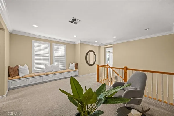 a spacious bathroom with a granite countertop sink and a mirror