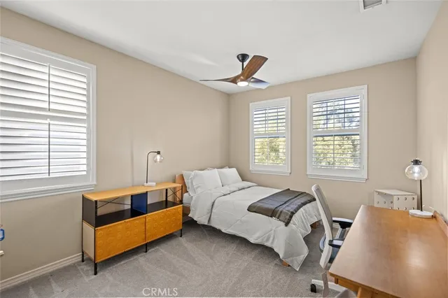 a view of room with furniture and a large window