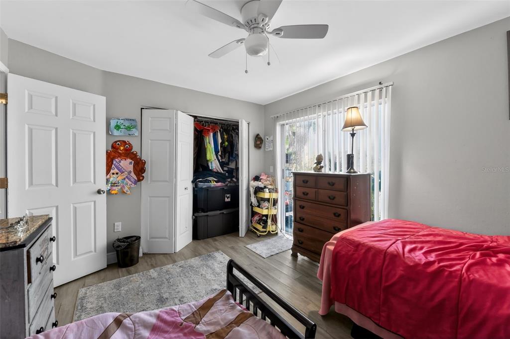 4154 16th Street East, Unit 15 Ellenton, FL 34222 - Photo 19 of 31 a bed room with a bed and a television