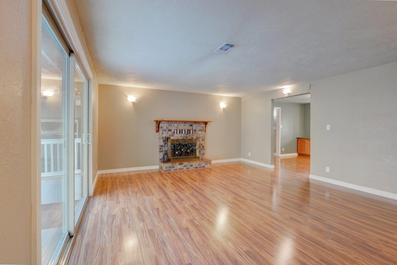 833 Upper Applegate Road Jacksonville, OR 97530 - Photo 5 of 58 a view of empty room with wooden floor