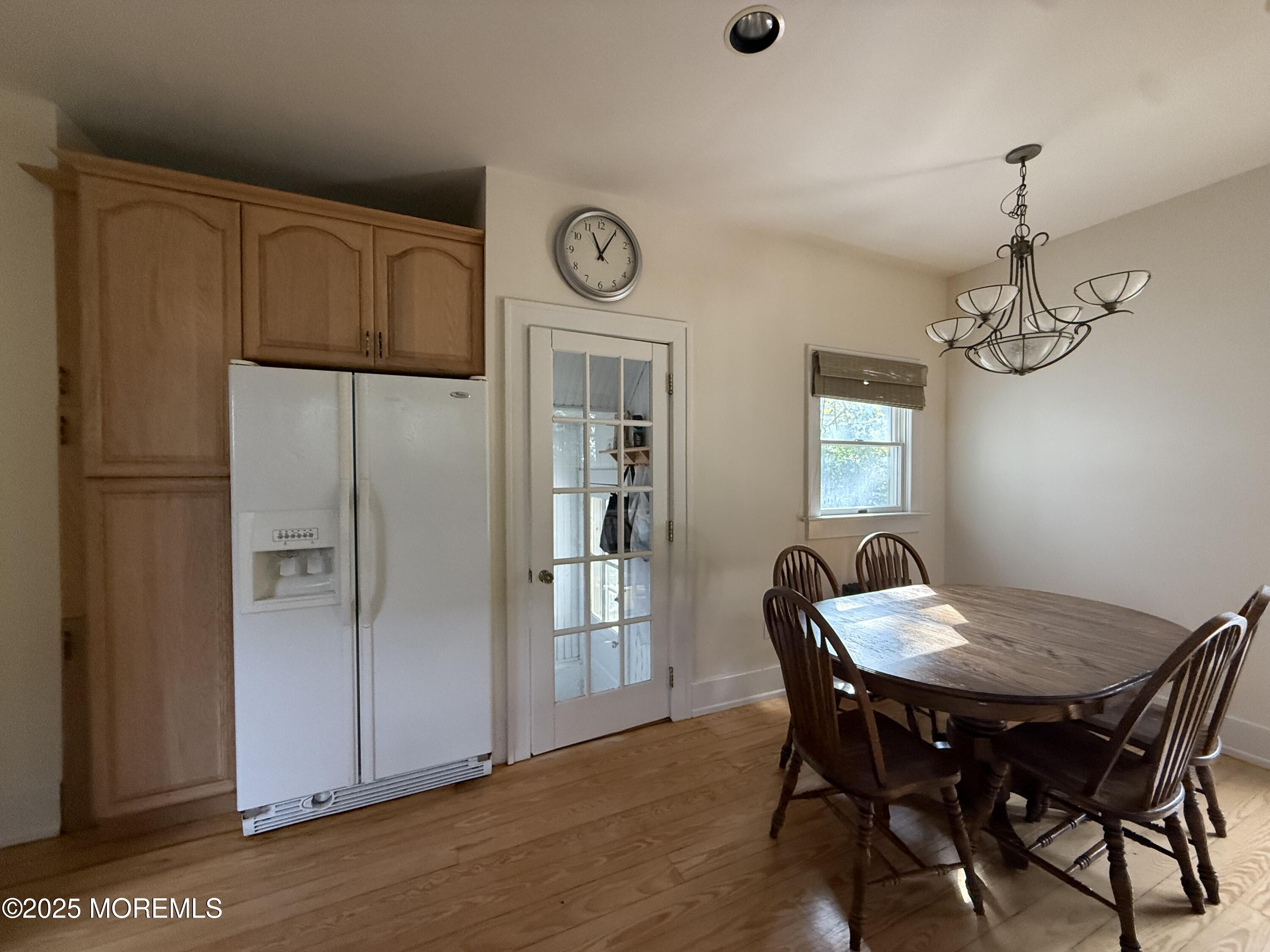 210 Lincoln Avenue, Unit WINTER 25 Long Branch, NJ 07740 - Photo 15 of 38 a view of a dining room with furniture