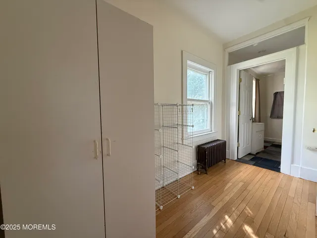 a bathroom with a tub a toilet and a sink