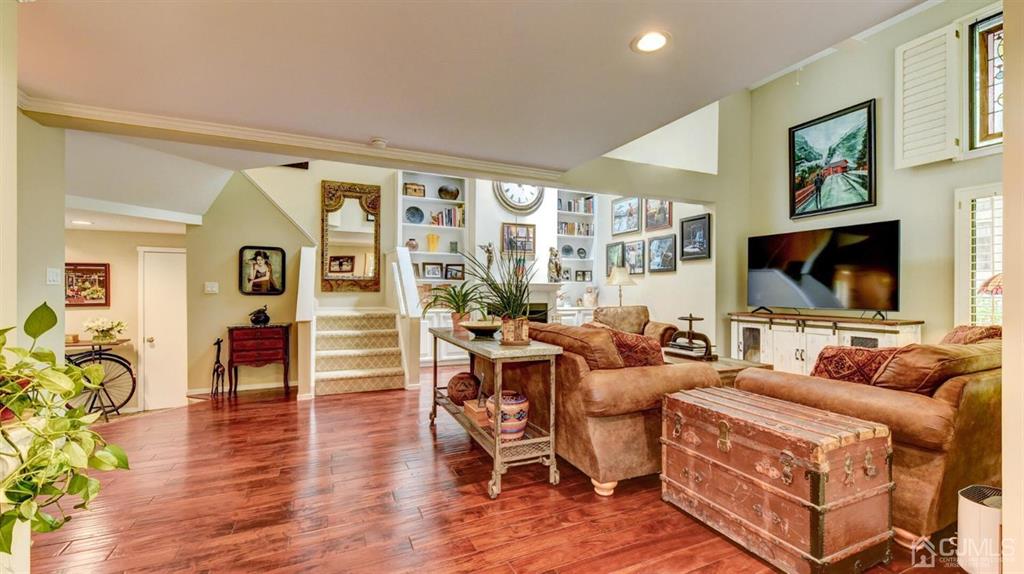 449 Sayre Drive Plainsboro, NJ 08540 - Photo 13 of 58 a living room with furniture and a flat screen tv