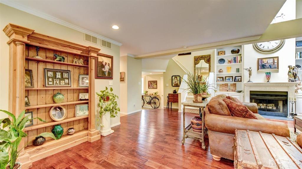 449 Sayre Drive Plainsboro, NJ 08540 - Photo 15 of 58 a living room with furniture and a fireplace